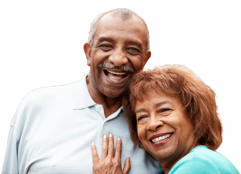 A happy older man and woman cuddling