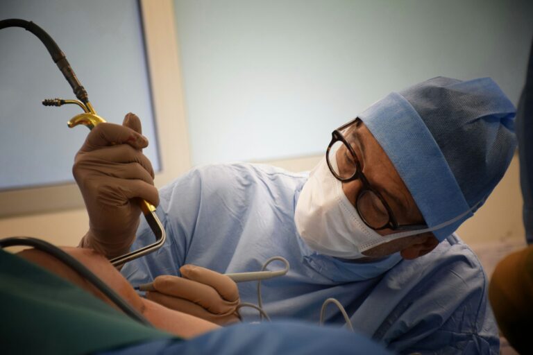 Surgeon operating on knee