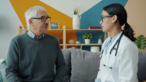 older gentleman meeting with doctor