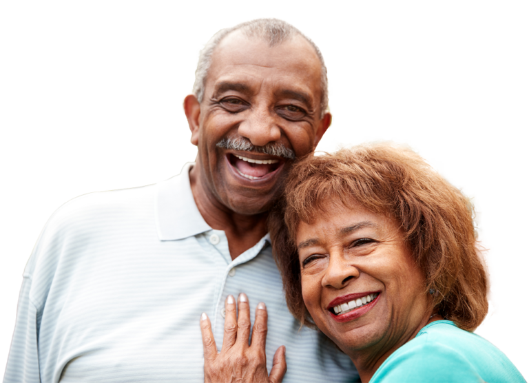 A happy older man and woman cuddling