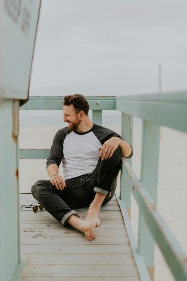 man sitting on a patio 